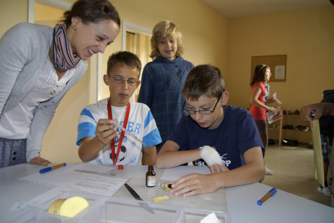 school support assistant with  a group of students